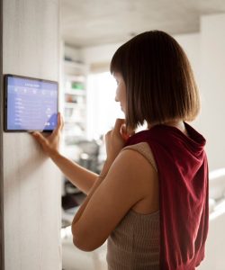 young-woman-using-home-technology_23-2149216695